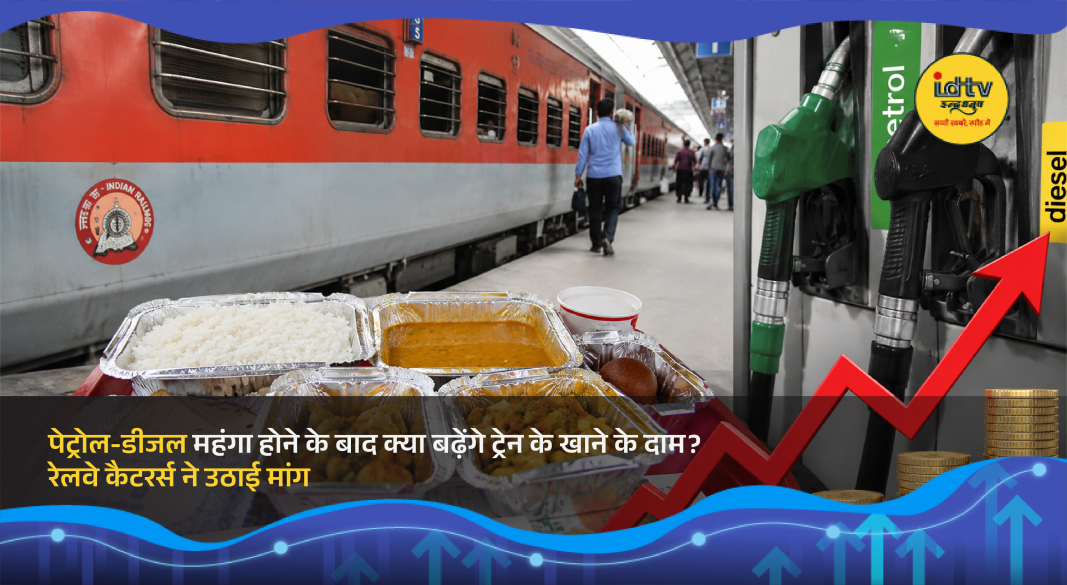 Railway pantry staff serving food to passengers amid debate over rising train meal prices in India
